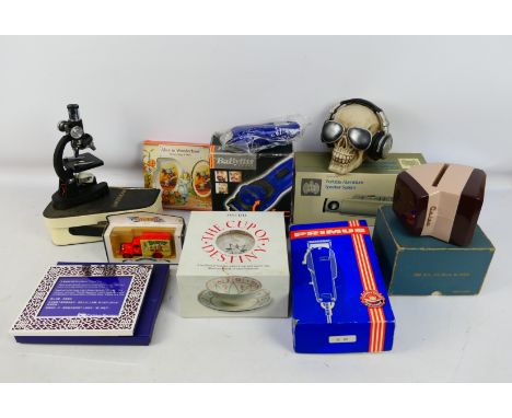 Lot to include hair clippers, boxed Ministry Of Sound portable speaker skull form money bank and other. [W]