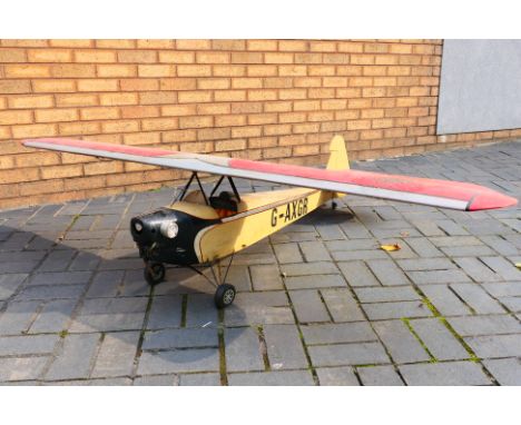 Unmarked Maker - A large kit built radio controlled model aircraft. The 'Aeronca Chief in style wooden frame model with regis