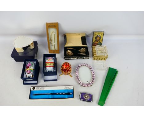A mixed lot to include decorative egg ornaments, plated ware, glassware, heart form trinket box and other, part boxed. [W]