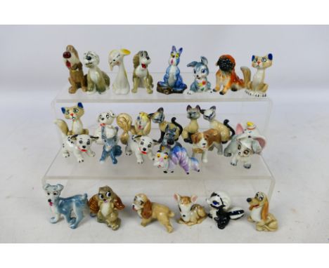 A quantity of Wade Whimsies and similar Disney and other figures to include 101 Dalmatians, Lady And The Tramp, Bambi and oth