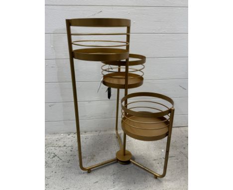 A contemporary gold painted three tier foldable plant stand (H66cm)