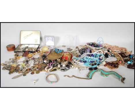 A collection of vintage costume jewellery to include a pair of stamped 925 silver earrings set with opalescent stones, a Cart