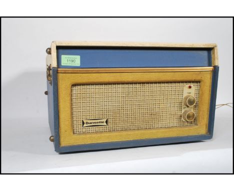 A vintage retro 20th Century two tone Dansette Bermuda four speed portable record player in blue and cream, fitted with a Mon