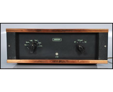 A vintage Jason JTV2 sound amplifier unit having copper mounts.&nbsp;