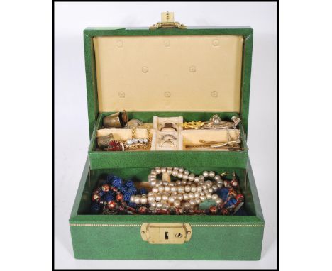 A collection of vintage 20th Century costume jewellery to include brooches, dress rings, cufflinks, necklaces, tie clips etc,