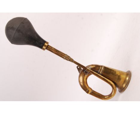 An early 20th century brass, possibly King Of The Road motorcar / automobile. Working order, with rubber end and shaped brass