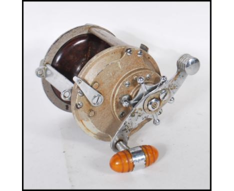 A vintage 20th Century Grice &amp; Young Christchurch Tatler Big Game Sea fishing Reel 4.5" diameter x 5" wide - bakelite fin