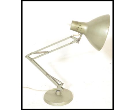 A vintage retro 20th Century 1001 Lamps anglepoise lamp raised on a circular base with conical enamel pendant shade. Measures