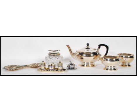 A collection of vintage 20th Century silver plated items to include tea service,cruet set, rococo chase decorated pin dish et