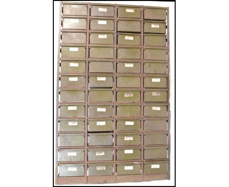 A vintage 20th Century large&nbsp;bank of 48 industrial / utility painted steel storage drawers each drawer with full length 