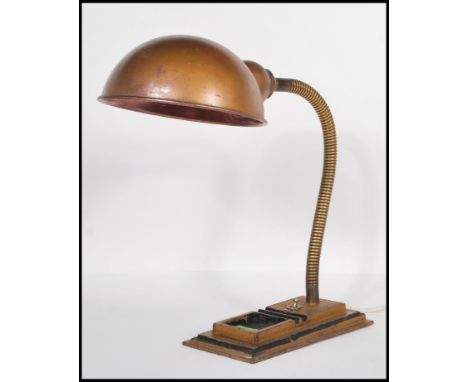 A vintage 20th century Hawkins of England Industrial Gooseneck desk / table lamp with a steel demi lune pendant shade having 