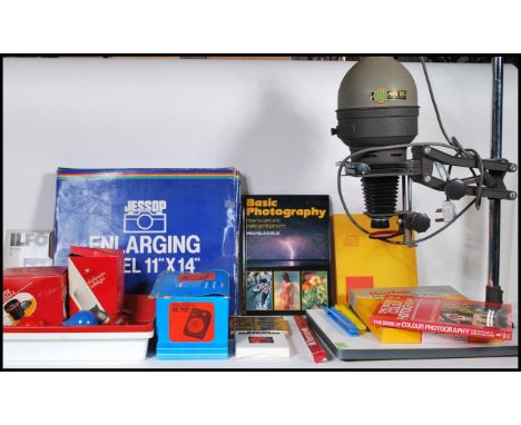 A retro mid 20th Century Prinz 500 Universal black and white photographic enlarger on stand. Together with a group of accesor