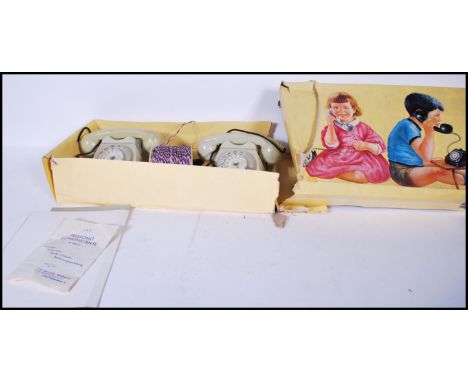 A vintage 1960's Italian Telephono boxed children's inter communication telephone set in the original box.&nbsp;