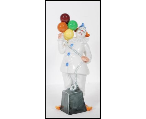 A Royal Doulton ceramic figurine of a Circus clown titled ' Balloon Clown ', No HN2894, dated 1985, designed by William K. Ha