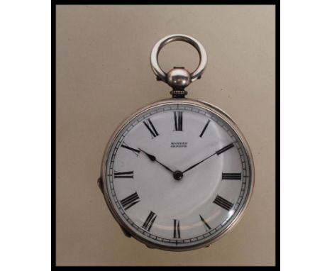 A 20th Century vintage Botten Geneve fine silver pocket watch having a white enamelled face with roman numerals to the chapte