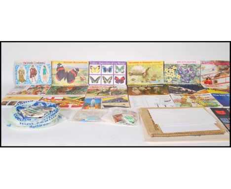 A collection of vintage 20th Century World stamps to include decimal and pre decimal contained in albums and loose together w
