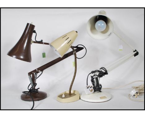 A mid 20th Century retro&nbsp;Herbert Terry Anglepoise desk lamp in a brown colourway having&nbsp;pendant shade raised on a c