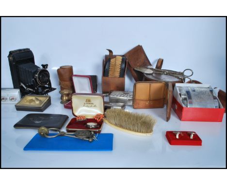 A group of mixed&nbsp;vintage curios / collectable items to include leather collar box and cased leather cloth brushes. Three