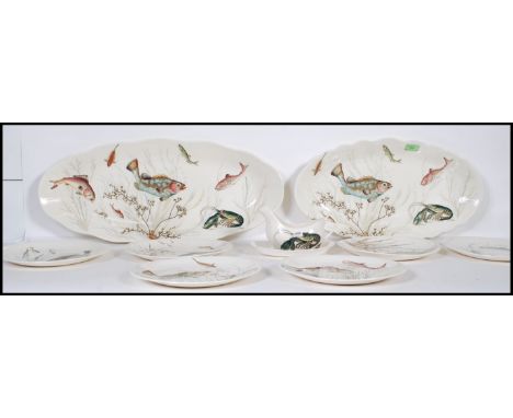 A collection of 20th Century ceramic Johnson Brother's fish pattern ceramics to include two large fish platters, six plates a