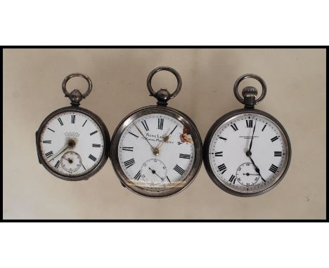 A group of three early 20th Century silver pocket watches to include an 'Acme Lever' H Samuel pocket watch with white enamell