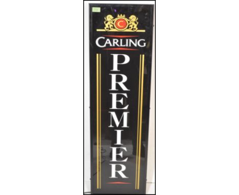 An upright advertising light box for ' Carling Premier ' having a perspex front with mounted back. Measures 105cm tall by 31c