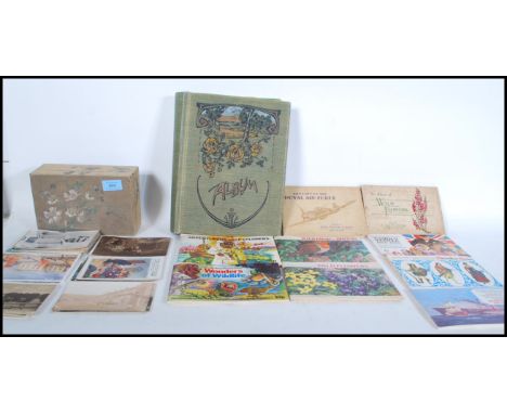 A selection of assorted vintage ephemera to include a collection of various postcards and greetings cards to include some Mab