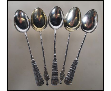 A set of five silver hallmarked Chinese silver teaspoons, each having Chinese characters decoration to the top with bamboo ef