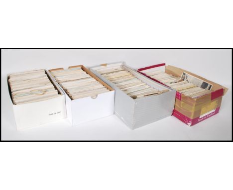 A collection of Vintage British postcards contained within four shoeboxes. Hoard of views from all over the UK.Unsorted but a