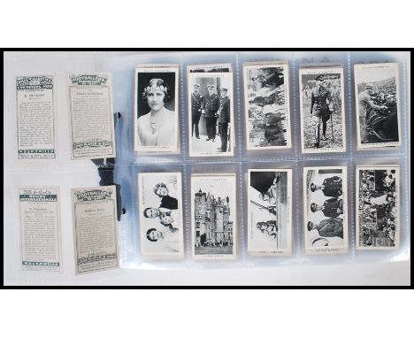 A collection of vintage 20th Century cigarette trade cards and giveaway collectors cards to include cards from Wills, Wills A