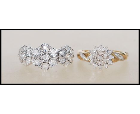 A hallmarked 9ct white diamond cluster ring having flower head illusion setting. Approx 21pts. Hallmarked 375 for London. Rin