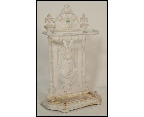 A 19th Century Victorian cast iron stick stand in the manor of Coalbrookdale having floral decoration with leaves and scrolls