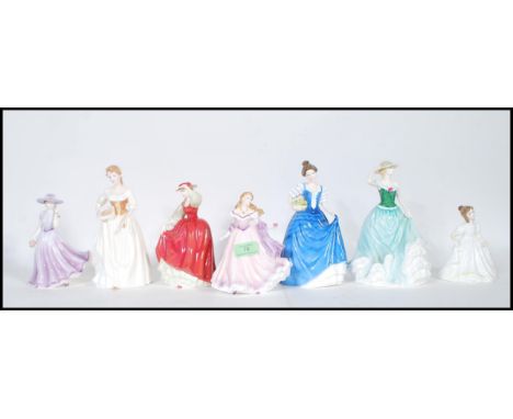 A selection of Royal Doulton porcelain figurines of ladies to include Pretty Ladies 'Buttercup', Classics Country Maid collec