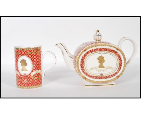 A James Sadler bone china Queen Elizabeth II commemorative Golden Jubilee teapot retaining its original box together with a m