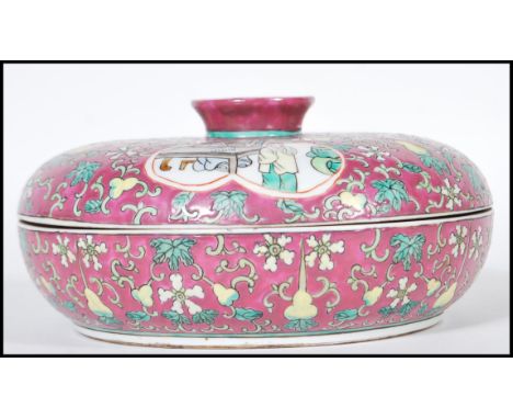 A early 20th Century 1920's Chinese lidded crudite having dark red enamelled ground with floral and fruit enamel decoration. 