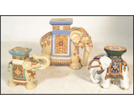 A 20th century Ceramic Plant Stand / stool in the form of an Asian / Indian Elephant together with another two of graduating 