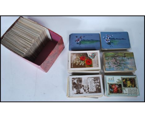 A collection of Vintage greetings type postcards approx 650. Highly decorative mostly with attractive colourful floral design