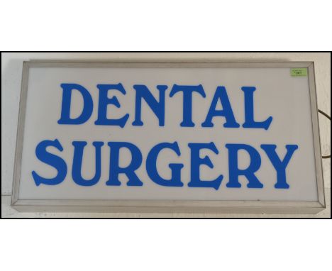 A 20th Century medical external double sided light box advertising sign, notation to both sides in blue lettering reading 'De