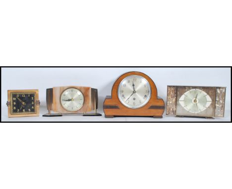 Two mid 20th Century vintage retro Metamec mantle clocks together with another of similar form and an oak cased mantel clock 