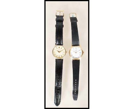 A pair of original vintage Rotary gents wristwatches comprising a hallmarked silver 925 watch having a white enamel face with
