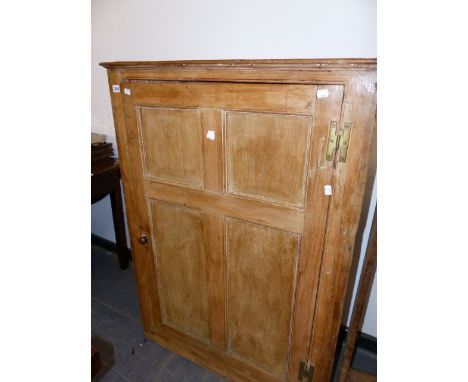 A 19tH.C.PINE CORNER CABINET WITH SINGLE FOUR PANEL DOOR.   W.104 x H.108cms.