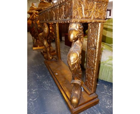 A MOTTLED PINK MARBLE TOP GILTWOOD CONSOLE TABLE, VINE MOULDED APRON ABOVE EAGLE HEADED, FRONT LEGS ON RECTANGULAR PLINTH BAS