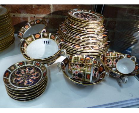 SIX PLACE SETTINGS OF CROWN DERBY 1128 PATTERN IMARI PALETTE WARES COMPRISING MEAT, FRUIT AND SIDE PLATES, COFFEE CANS AND SA