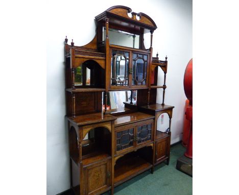 A LATE VICTORIAN BEVEL GLAZED ROSEWOOD SIDE CABINET, MIRROR BACKED SHELVES AROUND THE CUPBOARD CENTRAL TO THE SUPERSTRUCTURE,