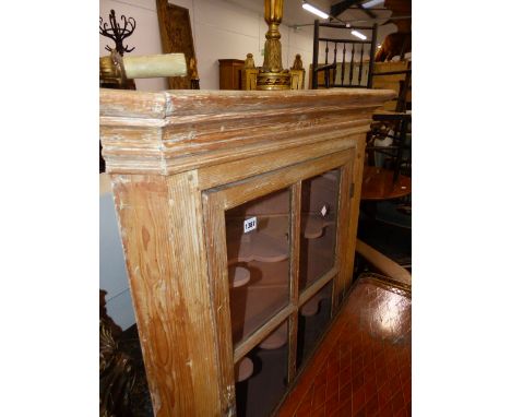 A 19th.C.COUNTRY PINE CORNER CABINET WITH GLAZED PANEL DOOR ABOVE CUPBOARD SECTION.    W.78.