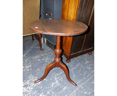 AN 18TH CENTURY OAK TRIPOD TABLE, THE CIRCULAR TOP ON BALUSTER COLUMN, DOWNSWEPT LEGS WITH LONG NOSE CLUB FEET.   Dia.52 x H.