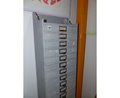 A VINTAGE PAINTED TALL CHEST OF FILE DRAWERS.   W.39 x H.177 x D.26cms.