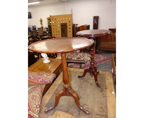 A VICTORIAN CARVED WALNUT LAMP TABLE WITH BARLEY TWIST SUPPORT TOGETHER WITH A GEORGIAN EXAMPLE.