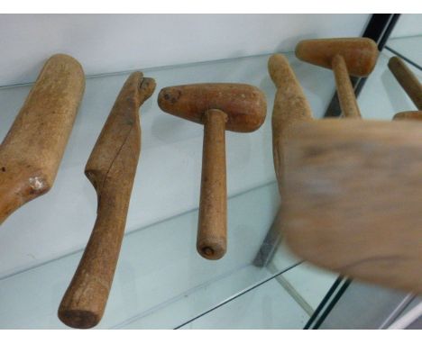 A COLLECTION OF VINTAGE PLUMBER'S LEAD WORKING MAULS AND MALLETS.