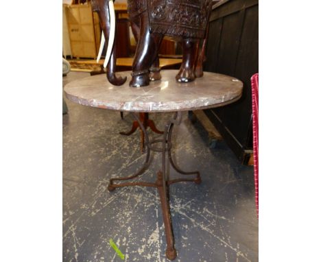 A FRENCH MOTTLED LIVER RED MARBLE CIRCULAR TABLE TOPPED WROUGHT IRON TRIPOD TABLE.&nbsp; &nbsp;Dia.77 x H.73cms.