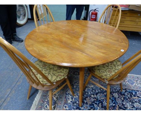 AN ERCOL PALE ELM DROP LEAF DINING TABLE AND A SET OF FOUR HIGH  HOOP BACK DINING CHAIRS.  (5)